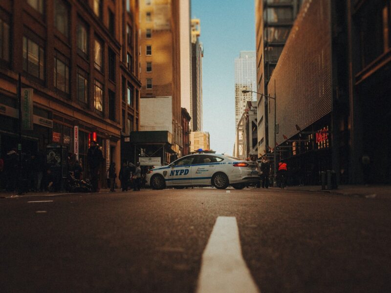 cars parked on side of the road during daytime