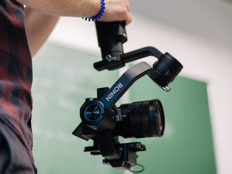 person holding Ronin camera mount