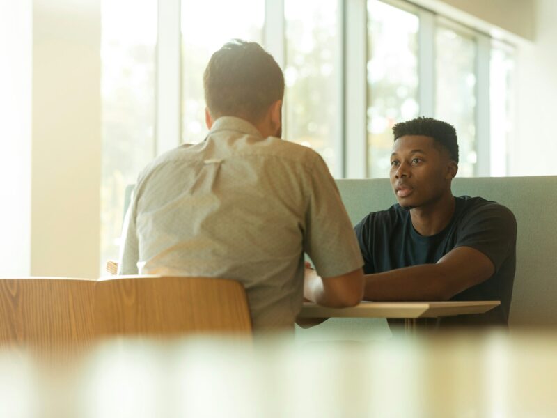 two men talking