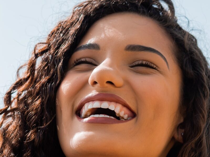 woman with brown hair smiling